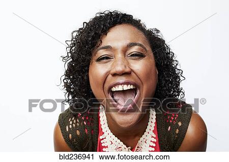 Stock Image - Mixed Race woman screaming. Fotosearch