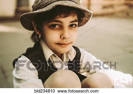 Old-fashioned Caucasian boy with black eye View Large Photo Image Stock Image - Old-fashioned Caucasian boy with black eye. Fotosearch