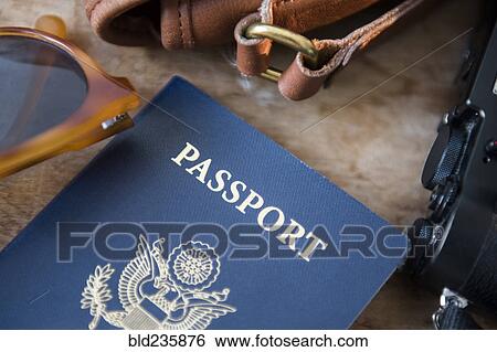"Passport, camera and sunglasses" View Large Photo Image Stock Photograph - "Passport, camera and sunglasses". Fotosearch