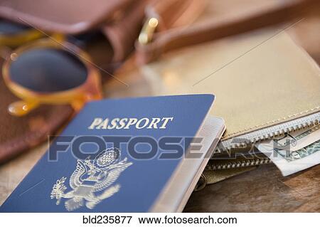 "Passport, wallet and sunglasses" View Large Photo Image Stock Photo - "Passport, wallet and sunglasses". Fotosearch