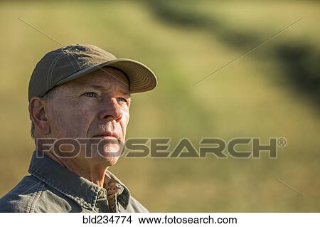 Pensive Caucasian farmer View Large Photo Image Picture - Pensive Caucasian farmer. Fotosearch