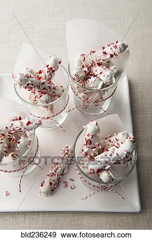 Stock Photo - Peppermint pretzels in glasses. Fotosearch