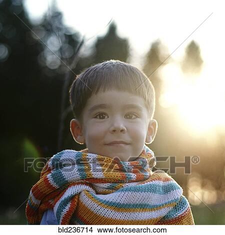 Portrait of Caucasian girl wearing multicolor scarf View Large Photo Image Picture - Portrait of Caucasian girl wearing multicolor scarf. Fotosearch