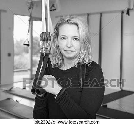 Portrait of Caucasian woman holding handles of resistance bands View Large Photo Image Stock Photography - Portrait of Caucasian woman holding handles of resistance bands. Fotosearch