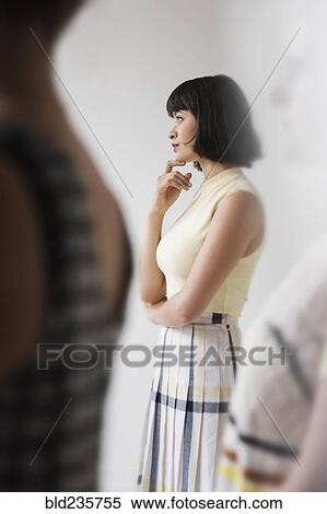 Portrait of pensive Hispanic woman View Large Photo Image Stock Photography - Portrait of pensive Hispanic woman. Fotosearch