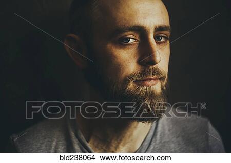 Portrait of serious Caucasian man with beard View Large Photo Image Picture - Portrait of serious Caucasian man with beard. Fotosearch