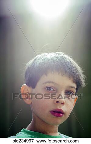 Portrait of serious mixed race boy View Large Photo Image Stock Photo - Portrait of serious mixed race boy. Fotosearch
