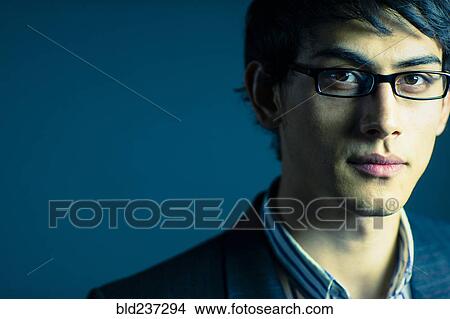Picture - Portrait of serious Mixed Race businessman. Fotosearch