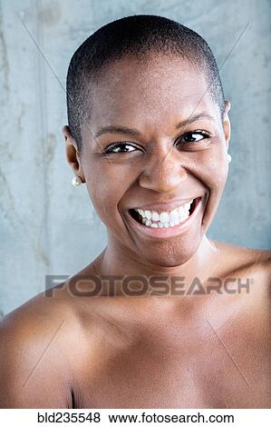 Stock Photo - Portrait of smiling Black woman. Fotosearch