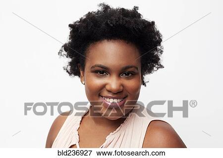 Stock Photo - Portrait of smiling Black woman. Fotosearch