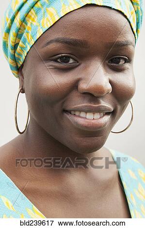Stock Photo - Portrait of smiling Black woman. Fotosearch