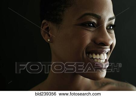 Portrait of smiling Black woman View Large Photo Image Stock Photograph - Portrait of smiling Black woman. Fotosearch