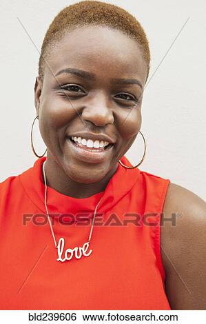 Portrait of smiling Black woman View Large Photo Image Stock Photograph - Portrait of smiling Black woman. Fotosearch