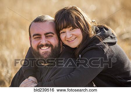 Portrait of smiling Caucasian couple View Large Photo Image Stock Photograph - Portrait of smiling Caucasian couple. Fotosearch
