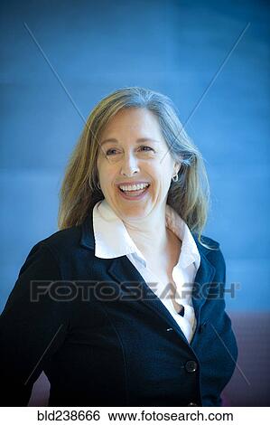 Portrait of smiling Caucasian businesswoman View Large Photo Image Stock Photograph - Portrait of smiling Caucasian businesswoman. Fotosearch