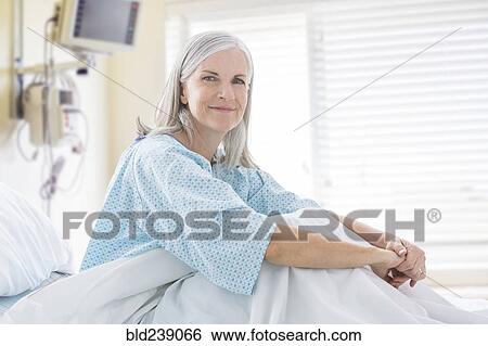 Portrait of smiling Caucasian woman in hospital bed View Large Photo Image Stock Photograph - Portrait of smiling Caucasian woman in hospital bed. Fotosearch