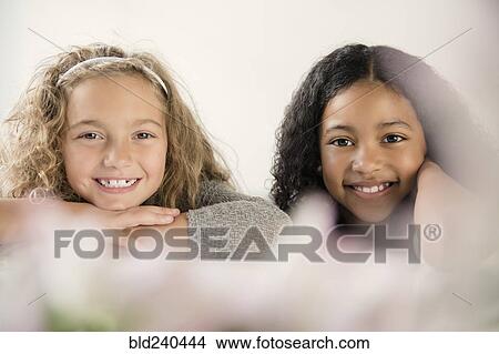 Picture - Portrait of smiling girls. Fotosearch