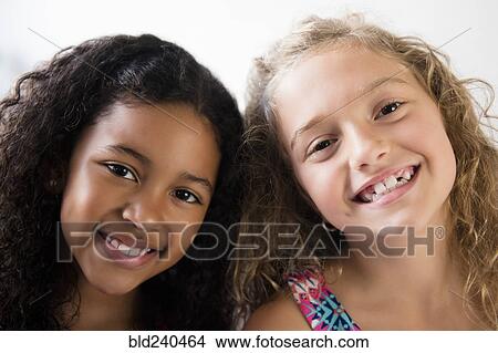 Picture - Portrait of smiling girls. Fotosearch