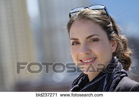 Portrait of smiling Hispanic woman outdoors View Large Photo Image Stock Image - Portrait of smiling Hispanic woman outdoors. Fotosearch