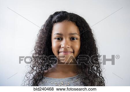 Portrait of smiling Mixed Race girl View Large Photo Image Stock Photo - Portrait of smiling Mixed Race girl. Fotosearch