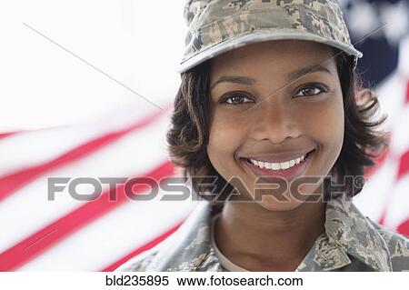 Portrait of smiling Mixed Race soldier near American flag View Large Photo Image Stock Photography - Portrait of smiling Mixed Race soldier near American flag. Fotosearch