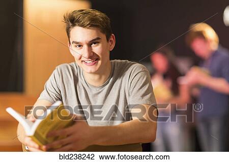 Stock Image - Portrait of smiling Mixed Race teenage boy. Fotosearch