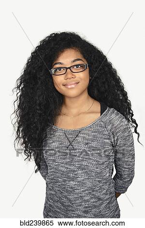 Stock Photography - Portrait of smiling Mixed Race teenage girl. Fotosearch