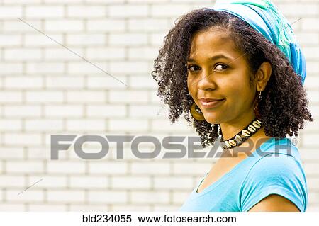Portrait of smiling Mixed Race woman View Large Photo Image Stock Photography - Portrait of smiling Mixed Race woman . Fotosearch