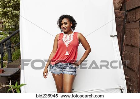 Stock Photography - Portrait of smiling Mixed Race woman. Fotosearch