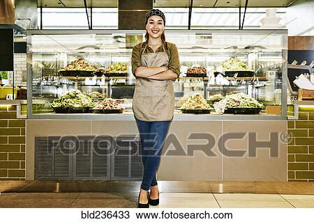 Portrait of smiling Mixed Race worker in food court View Large Photo Image Stock Image - Portrait of smiling Mixed Race worker in food court. Fotosearch