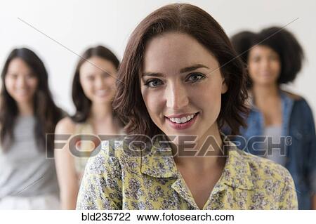 Stock Image - Portrait of smiling woman. Fotosearch
