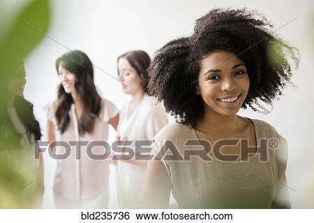 Portrait of smiling woman View Large Photo Image Stock Photograph - Portrait of smiling woman. Fotosearch