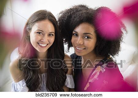 Portrait of smiling women View Large Photo Image Stock Photo - Portrait of smiling women. Fotosearch