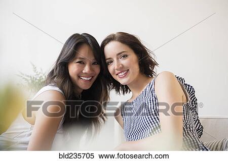 Stock Photography - Portrait of smiling women. Fotosearch