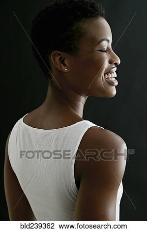 Profile of laughing Black woman View Large Photo Image Stock Image - Profile of laughing Black woman. Fotosearch