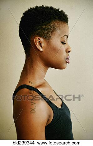 Picture - Profile of serious Black woman. Fotosearch
