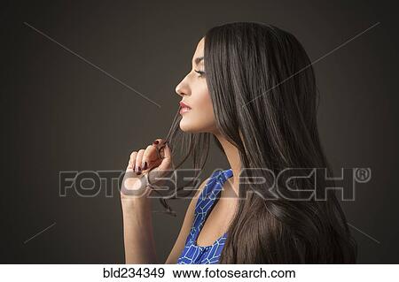 Profile of serious Mixed Race woman View Large Photo Image Stock Photo - Profile of serious Mixed Race woman. Fotosearch