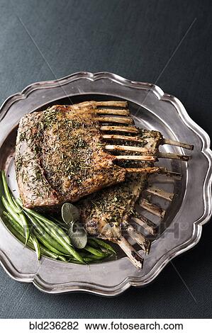 Rack of lamb and green beans on silver platter View Large Photo Image Stock Image - Rack of lamb and green beans on silver platter. Fotosearch
