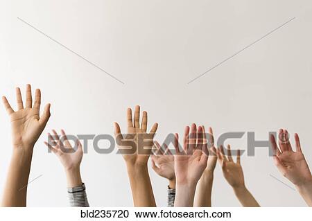 Raised hands of women View Large Photo Image Stock Image - Raised hands of women. Fotosearch