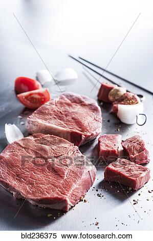Stock Photography - Raw sirloin tip steak cubes for skewer. Fotosearch