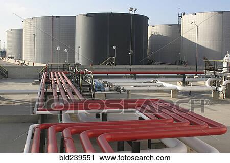 Red pipes and storage tanks View Large Photo Image Stock Image - Red pipes and storage tanks. Fotosearch