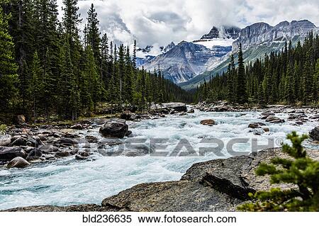 River rapids flowing near mountain View Large Photo Image Stock Photography - River rapids flowing near mountain. Fotosearch