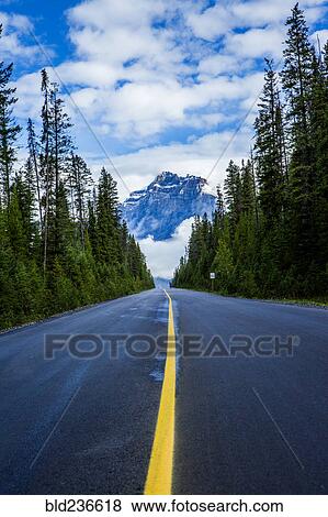 Stock Photo - Road in mountain valley. Fotosearch