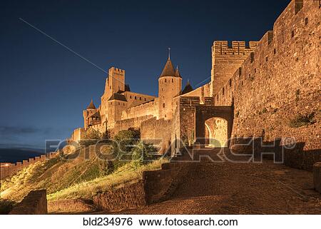 Stock Photograph - "Road to castle at night in Carcassonne, Languedoc-Roussillon, France". Fotosearch