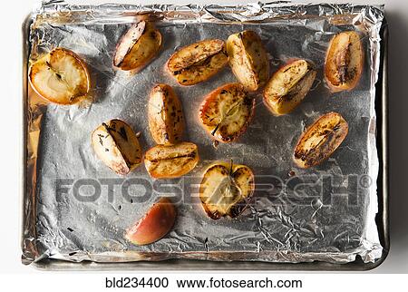 Roasted apples on tray View Large Photo Image Stock Image - Roasted apples on tray. Fotosearch