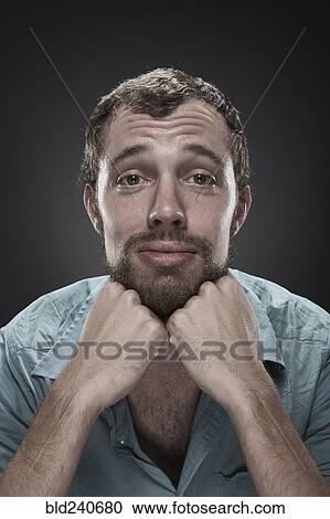 Sad man with hands on chin View Large Photo Image Stock Image - Sad man with hands on chin. Fotosearch