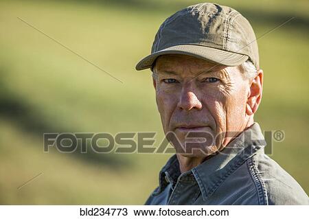 Serious Caucasian farmer View Large Photo Image Stock Image - Serious Caucasian farmer. Fotosearch