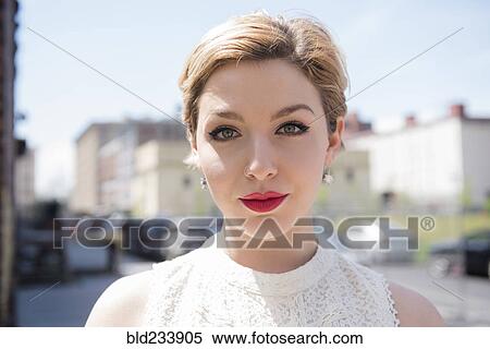 Serious Caucasian woman in city View Large Photo Image Stock Photography - Serious Caucasian woman in city. Fotosearch
