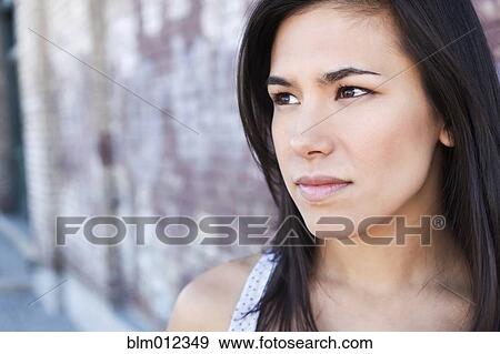 Serious mixed race woman View Large Photo Image Stock Photo - Serious mixed race woman. Fotosearch