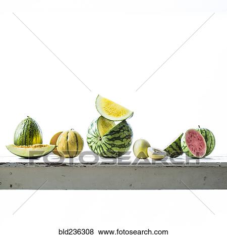 Sliced melons on table View Large Photo Image Stock Photo - Sliced melons on table. Fotosearch